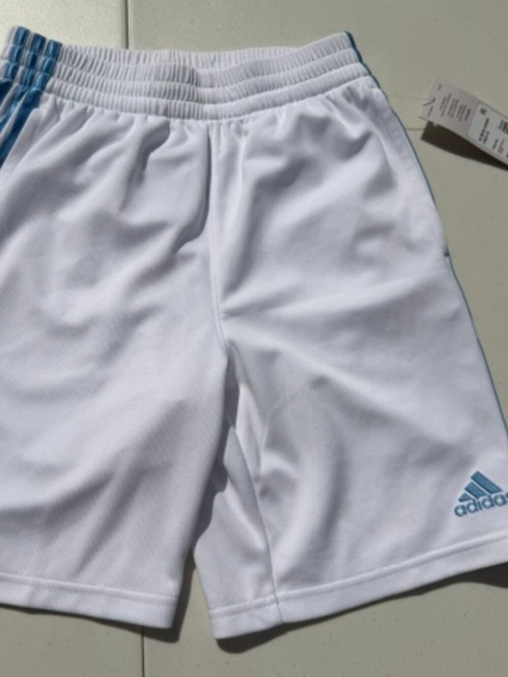 Adidas brand new kids shorts Size medium (10-12) white with blue stripes